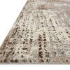 Side angle showing low pile and tight binding on the mocha rug edge