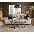 Two Muse Bunching Tables styled as end tables with decorative items in a modern living room