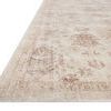 Marcella rug angled view highlighting low pile texture and distressed border detailing