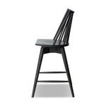 Close-up view focusing on the right side backrest vertical slats and top rail profile