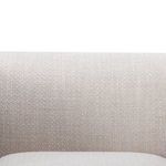 Close-up showing fine fabric weave and smooth rounded corner of armrest