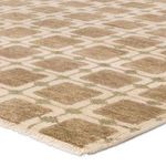 Close-up corner view showing texture and fringed edge of Japera geometric rug