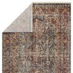 Folded layers of Zakaria rug revealing detailed pattern and texture variations