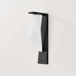 Andros Wall Sconce at a slight angle highlighting sleek black metal finish and curved glass shade
