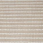 Detailed horizontal view of woven beige and white striped upholstery texture on bench cushion