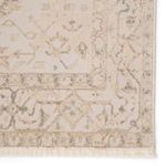 Close-up revealing vintage pattern, metallic gold accents, and plush texture