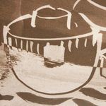 Close detail of bottom-left vessel with striped pattern and brown brush strokes on canvas