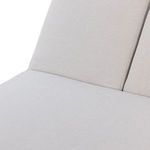Detailed view of cushions' upholstery seam and smooth fabric finish on adjustable backrest