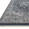 Close-up angled side view of Samra Denim Grey Rug highlighting texture and fringe on one edge