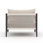 Back view with vertical rope weaving contrasted against bronze finish frame