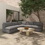 Dark gray Miles outdoor sectional configured in an L-shape with natural wood coffee table on patio.