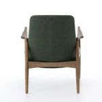 Back view of chair showing smooth leather backrest and oak frame details