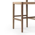 Lower section of Hamlin Stool showing oak legs and horizontal footrest bars