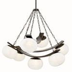 Duxbury Chandelier isolated on white background, side angle showing metal chains and curved bands