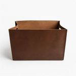 Front view showing smooth chestnut leather surface without visible seams