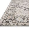 Angled side view highlighting rug’s low pile and intricate pattern