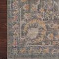 Corner close-up on wood floor showing intricate pattern with floral motifs and soft yellow accents