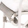 Close-up of Lido chair seat edge with woven detailing and fabric cushion texture