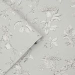 Wallpaper with white botanicals and birds on a steel grey background featuring floral and leaf patterns