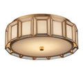 Flush mount shown at slight angle highlighting contrast between opaque white glass and brass metal