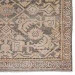 Detailed zoom on corner highlighting woven edges and slight distressing of trellis pattern