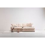 Minimalist studio setting with Godenza small walnut coffee table paired with large beige sectional sofa on light rug