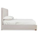 Side profile of Mason panel bed highlighting tufted headboard and low footboard