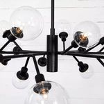 Central section of chandelier with connecting arms and attached clear glass bulbs