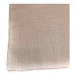 Close-up texture of beige fabric cushion material on Orville chair seat