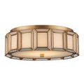Flush mount ceiling light displayed in room setting, mounted on white ceiling