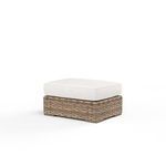 Havana Ottoman shown from a slightly different angle, highlighting its square wicker base and cushion shape