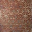 Square terracotta area rug with dense floral design and detailed border in soft muted tones