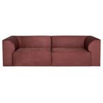 Isla Sofa front view highlighting symmetrical gently curved armrests and straight base.
