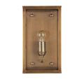 Front view of Royster Outdoor Wall Sconce featuring metal backplate with four large screws illuminated by bulb inside
