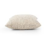Side profile of Callum Pillow showing its thickness and subtle variations in boucle weave