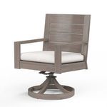 Front angled view emphasizing clean lines and driftwood finish of Laguna swivel dining chair