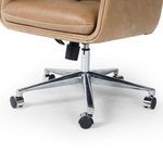 Focus on polished aluminum caster base with height adjustment lever and black caster wheels