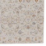 Detailed view of central floral motif and subtle color blending in rug's pattern