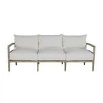 Alternative front view of sofa highlighting even spacing of cushions and teak frame details