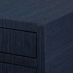 Close-up on Florence dresser drawer fronts showing subtle textured lines in selvage blue finish