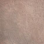Zoomed-in view of textured brown surface with fine linear and dot patterns on Midnight Harvest painting