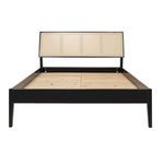 Front facing view of bed showcasing the full width cane headboard and base slats