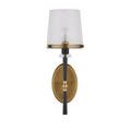 Lyndall Wall Sconce in supportive oval antique brass backplate with visible bulb and clear glass shade