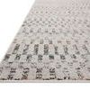 Low angle side view showing rug’s texture and short pile height
