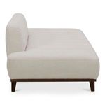 Side profile of Kenzie Accent Chair showing padded armrest and textured upholstery close-up