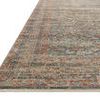 Close-up angled edge view showing low pile and detailed border pattern in Heritage Blue Rust Rug