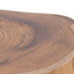 Close-up of stool top highlighting rich teak wood color and smooth polished texture