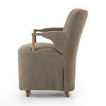 Side profile of Brently Dining Chair highlighting curved back and oak arm detail