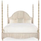 Front view of queen-sized poster bed highlighting symmetrical rope-wrapped posts and curved headboard