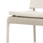 Close-up of textured light taupe fabric showing fine weave detail